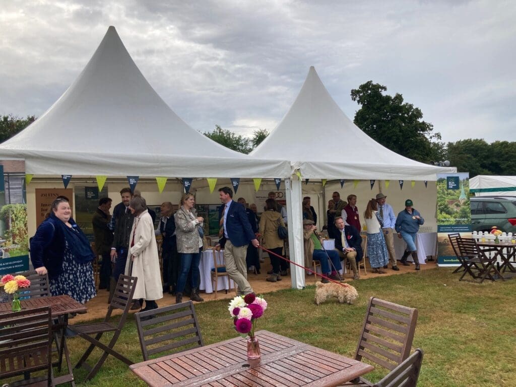 Outdoor marquee at The Alresford Show with visitors arriving
